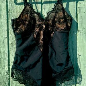 Pincy one piece lingerie black with tan. Kind of spanx like.